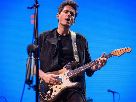 what genre of music is john mayer what are some of his most iconic guitar solos?